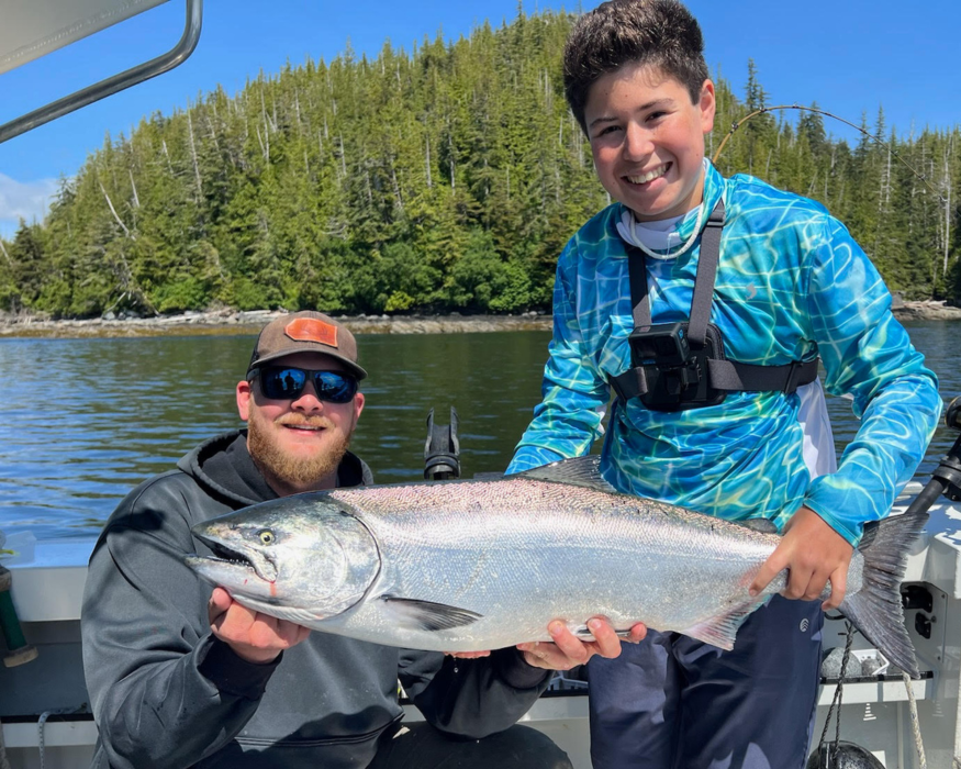 Captain Tony, a ketchikan fishing guide, holding a huge salmon