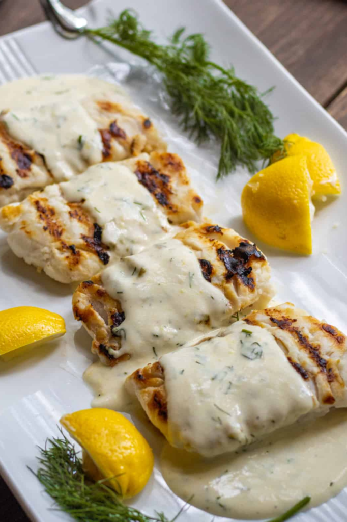 Grilled halibut in a lemon dill cream sauce